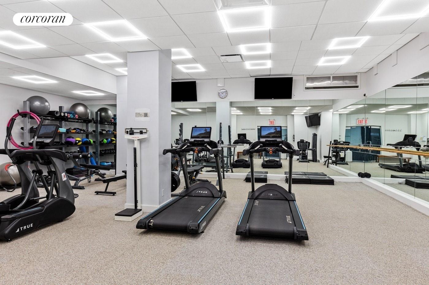 2 Sutton Place South, Unit 11B Manhattan, NY 10022 - Photo 9 of 10 a view of a room with gym equipment