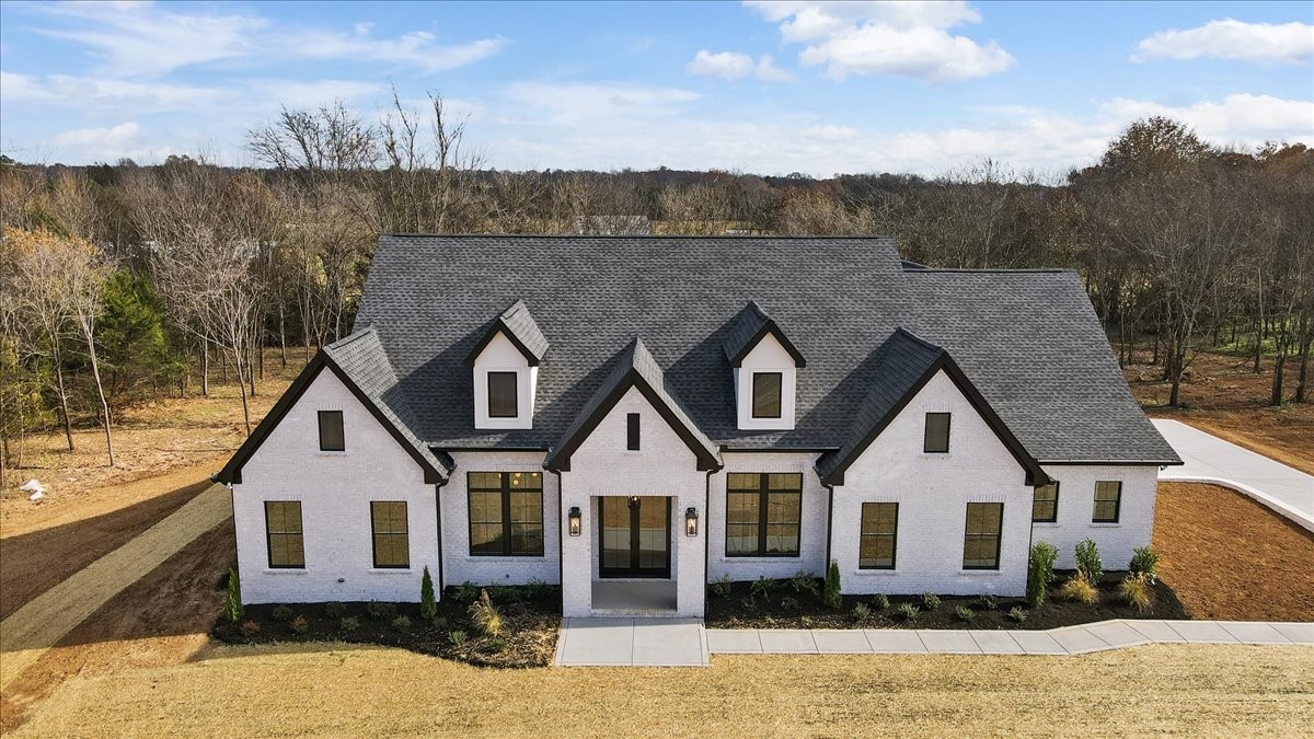 2412 Joe Brown Road Spring Hill, TN 37174 - Photo 1 of 86 an aerial view of a house with a yard