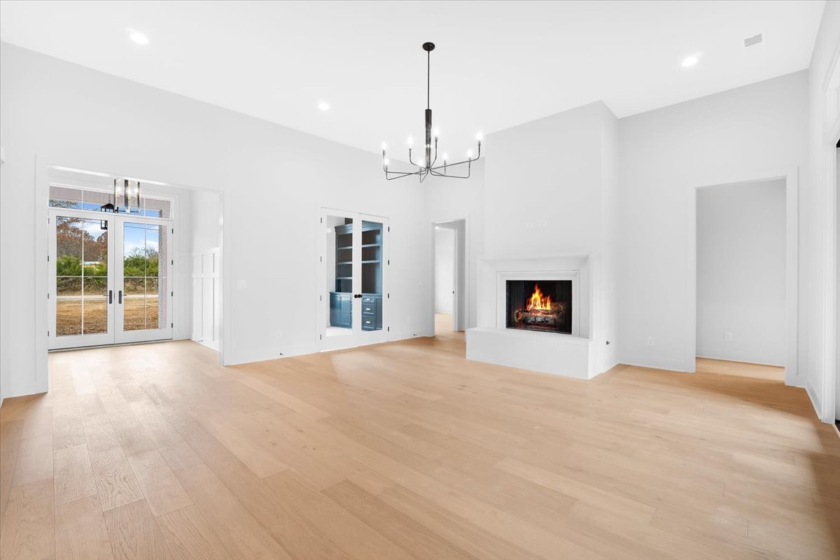 2412 Joe Brown Road Spring Hill, TN 37174 - Photo 17 of 86 a view of an empty room with a window and fireplace