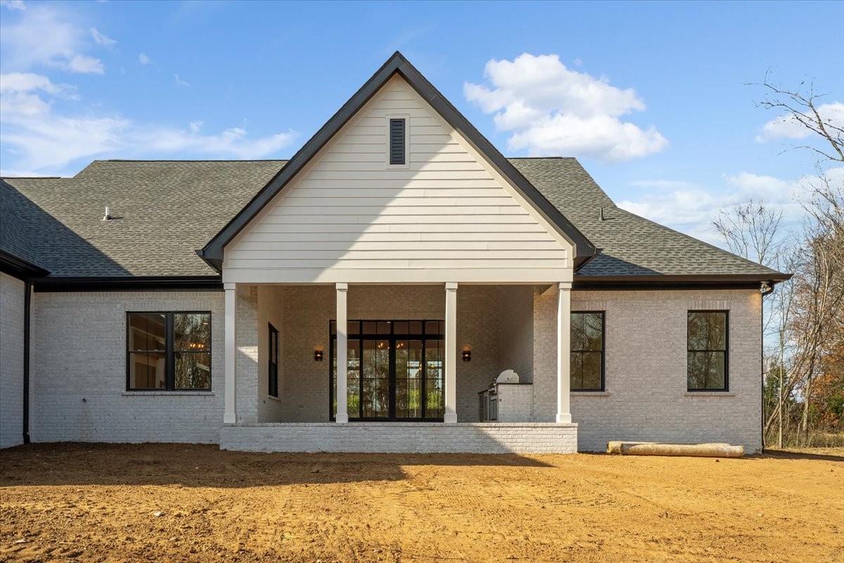 2412 Joe Brown Road Spring Hill, TN 37174 - Photo 32 of 86 a view of yellow house with a outdoor space
