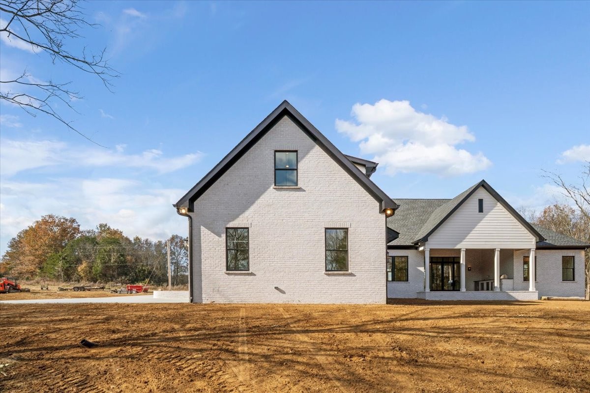 2412 Joe Brown Road Spring Hill, TN 37174 - Photo 34 of 86 a front view of a house with a yard