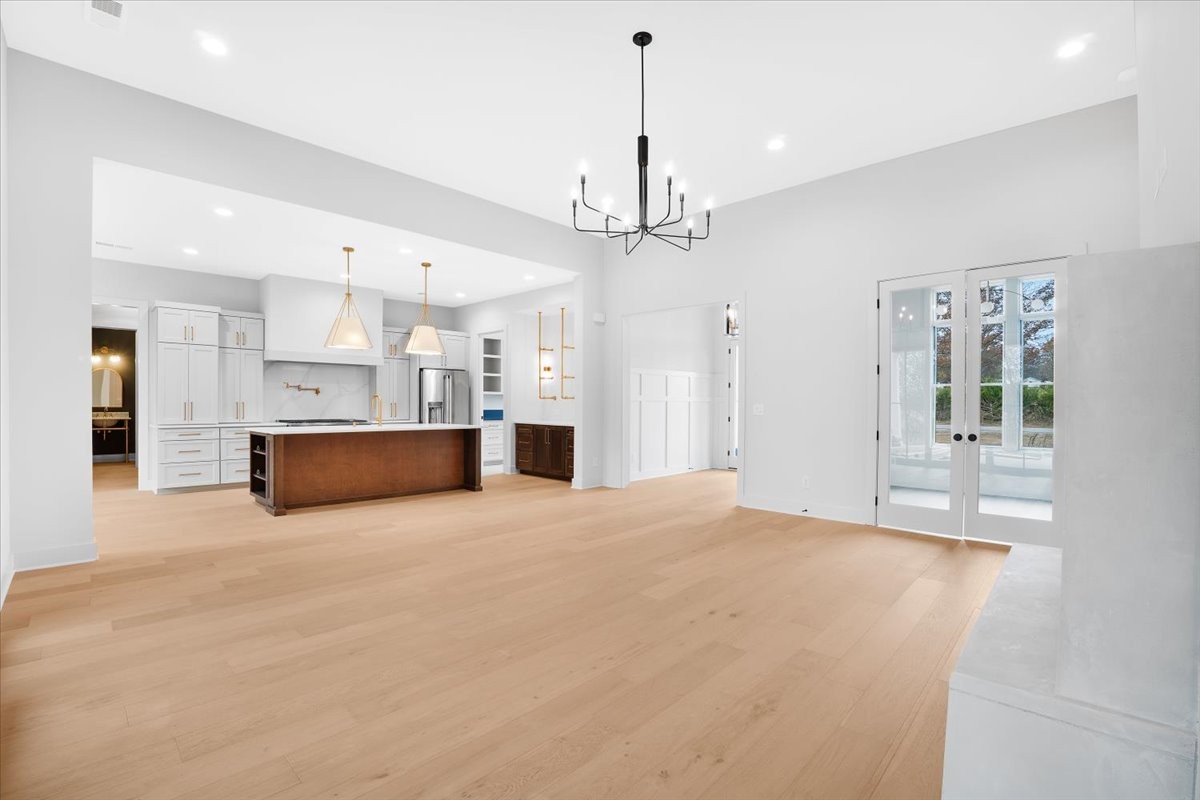 2412 Joe Brown Road Spring Hill, TN 37174 - Photo 5 of 86 a view of a kitchen with a sink and a chandelier