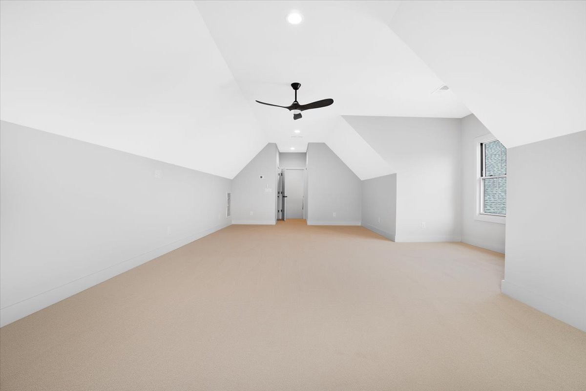 2412 Joe Brown Road Spring Hill, TN 37174 - Photo 58 of 86 an empty room with a ceiling fan and a ceiling fan