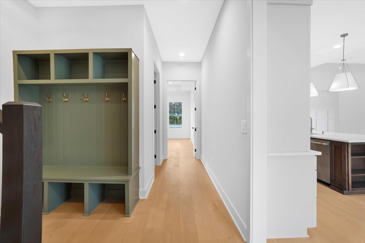 2412 Joe Brown Road Spring Hill, TN 37174 - Photo 75 of 86 a view of a hallway with wooden floor and staircase