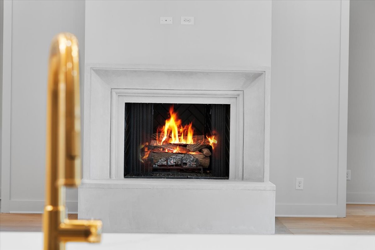 2412 Joe Brown Road Spring Hill, TN 37174 - Photo 8 of 86 a living room with a flat screen tv and a fireplace