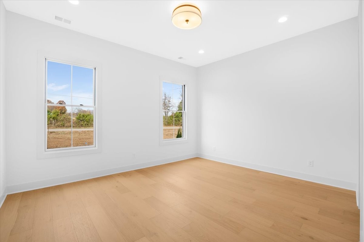 2412 Joe Brown Road Spring Hill, TN 37174 - Photo 82 of 86 an empty room with windows
