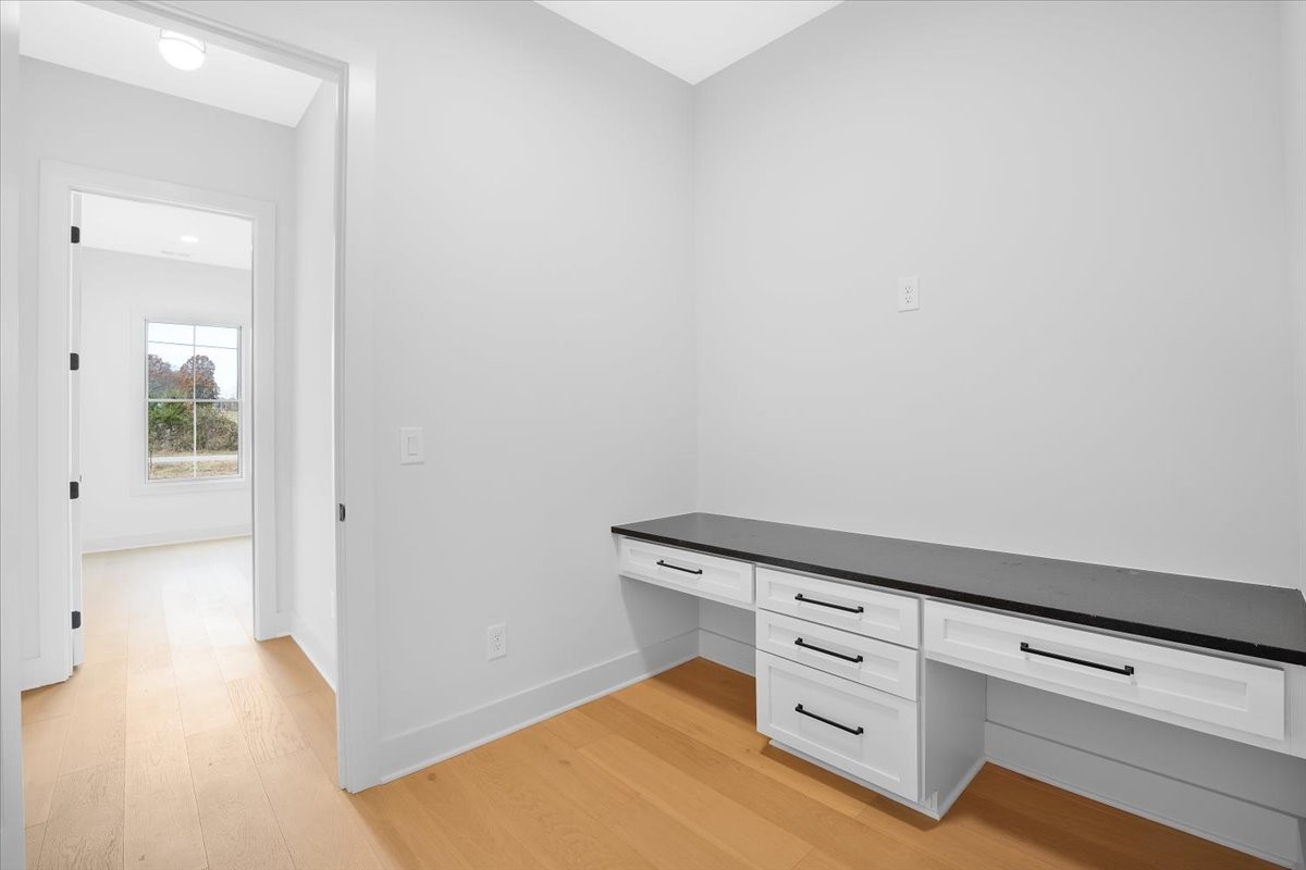 2412 Joe Brown Road Spring Hill, TN 37174 - Photo 83 of 86 a room with white cabinets and white appliances