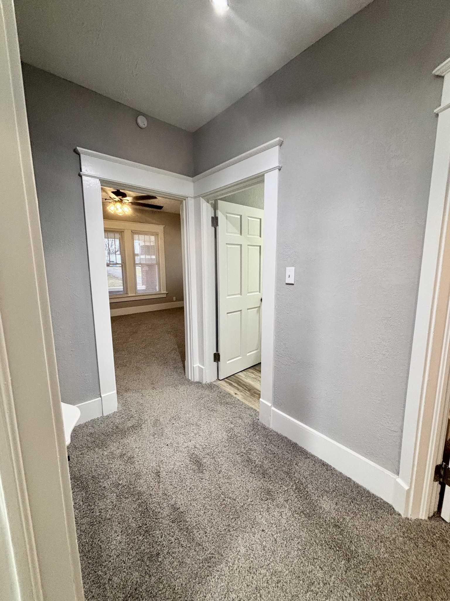 40 Line Street Cadiz, KY 42211 - Photo 14 of 53 an empty room with a fireplace and a window