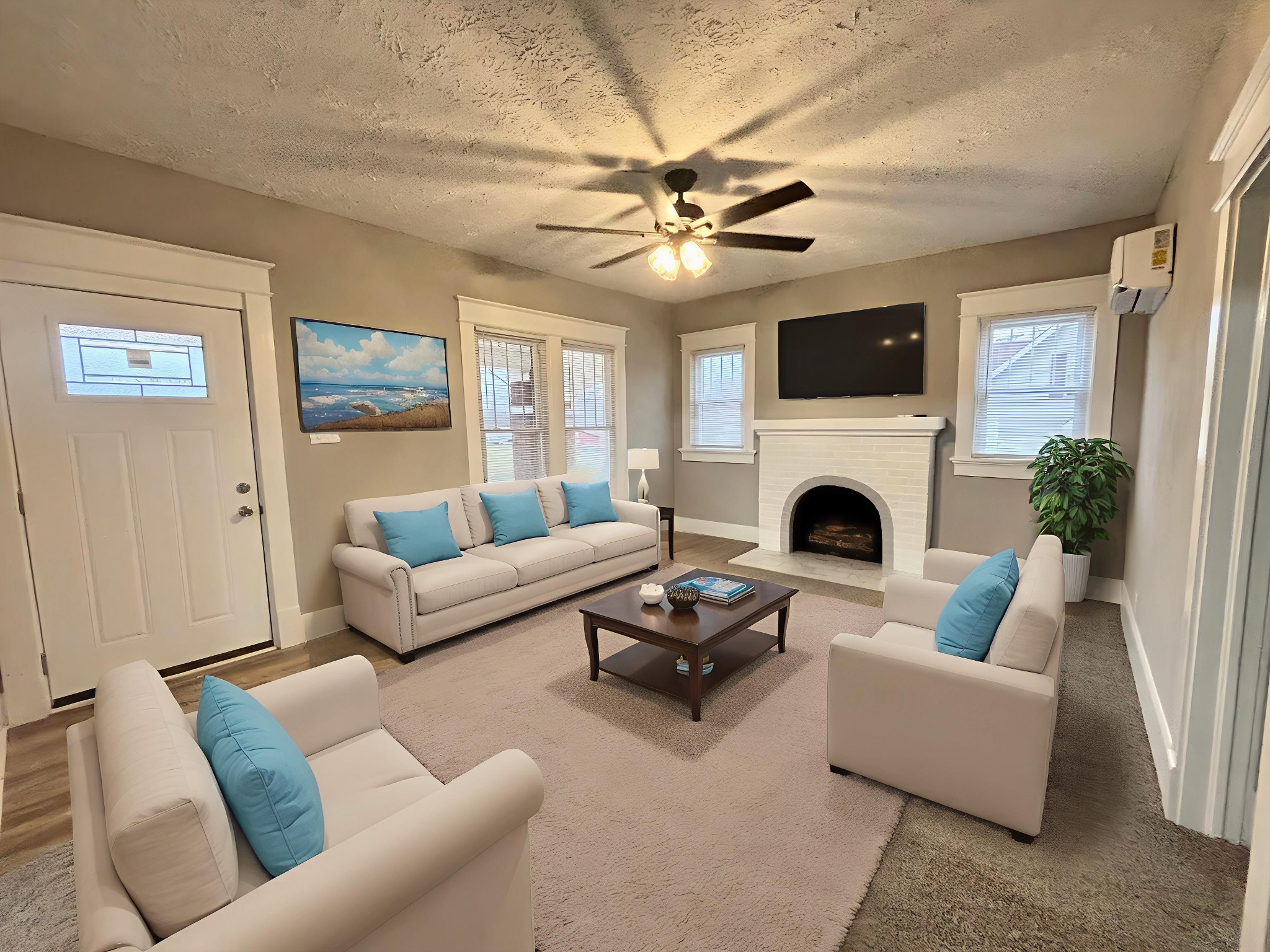 40 Line Street Cadiz, KY 42211 - Photo 15 of 53 a living room with furniture a fireplace and a flat screen tv