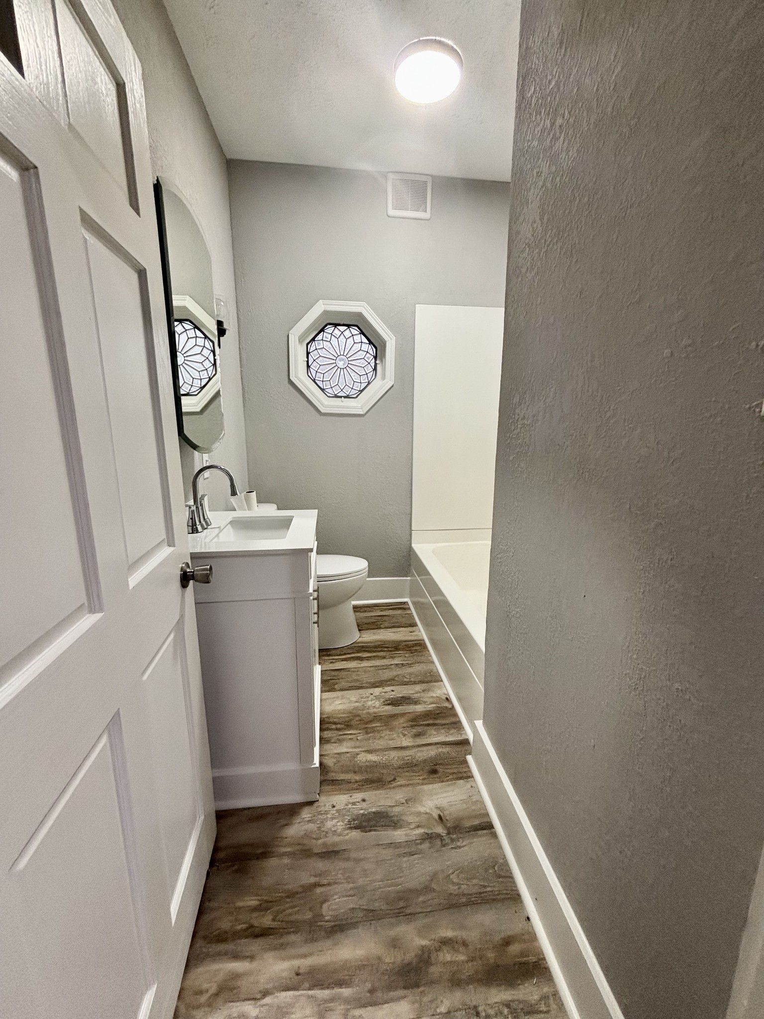 40 Line Street Cadiz, KY 42211 - Photo 16 of 53 a view of a hallway with washer and dryer