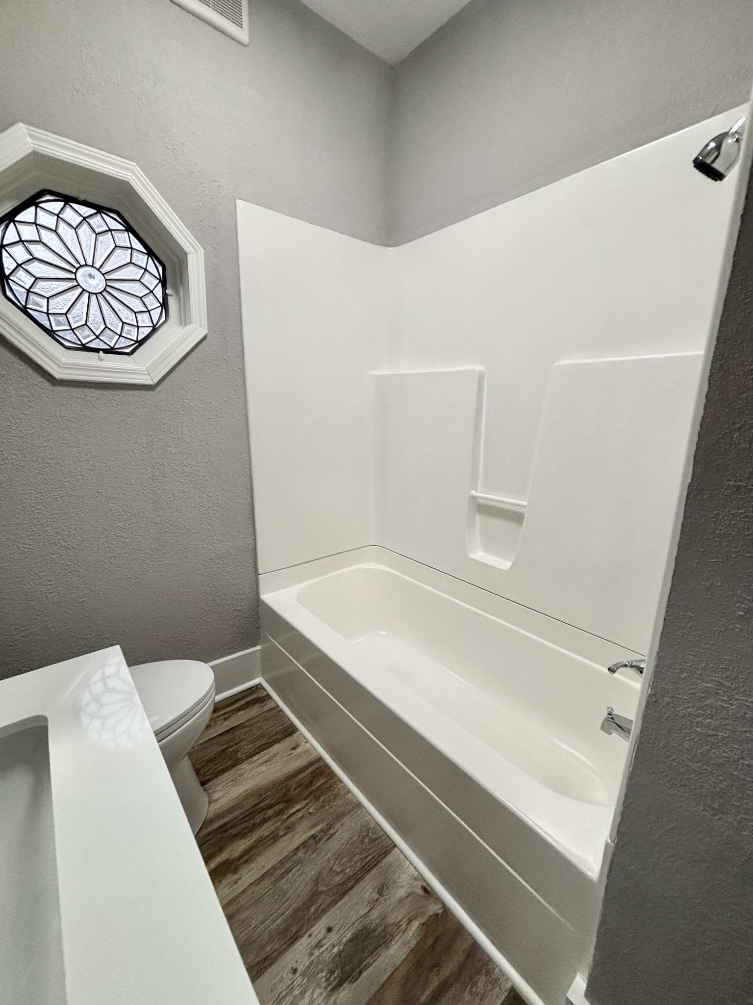 40 Line Street Cadiz, KY 42211 - Photo 18 of 53 a bathroom with a bathtub and a shower