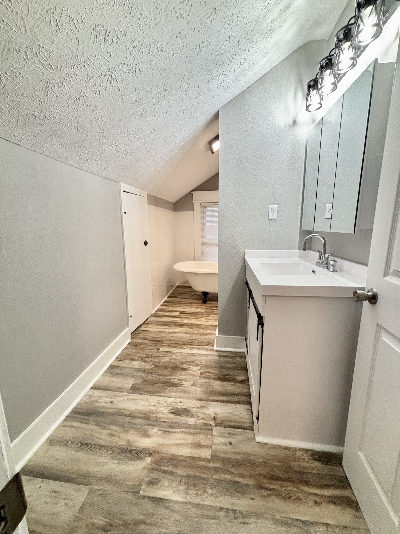 40 Line Street Cadiz, KY 42211 - Photo 28 of 53 a bathroom with a sink and a mirror