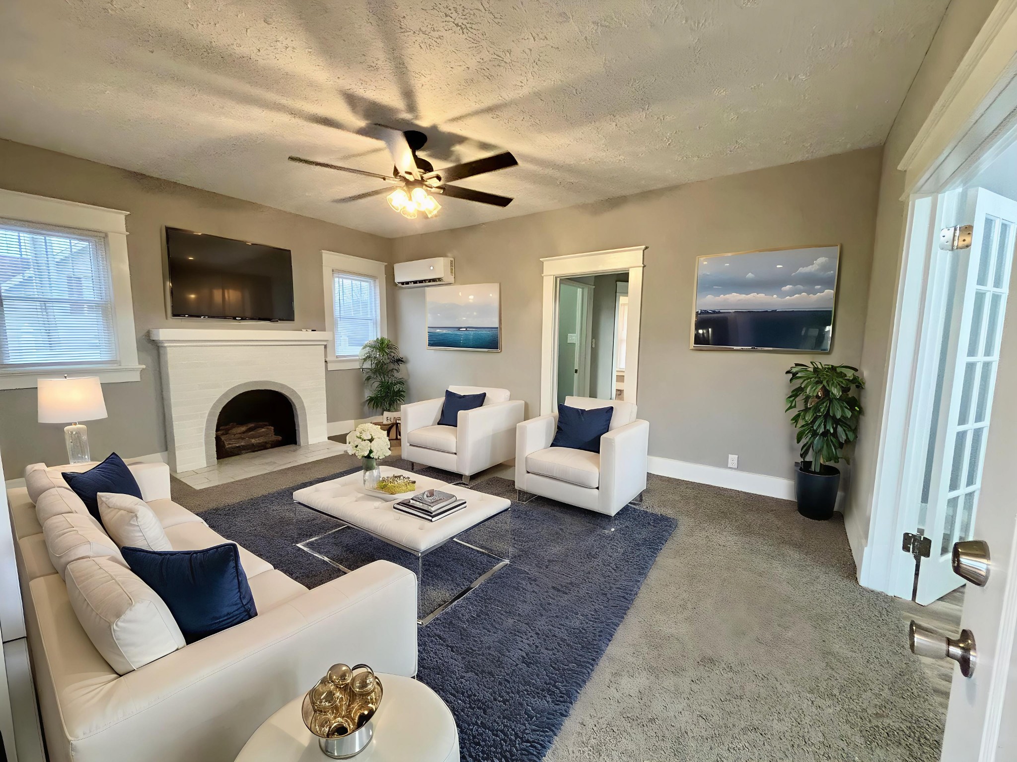 40 Line Street Cadiz, KY 42211 - Photo 5 of 53 a living room with furniture a flat screen tv and a fireplace