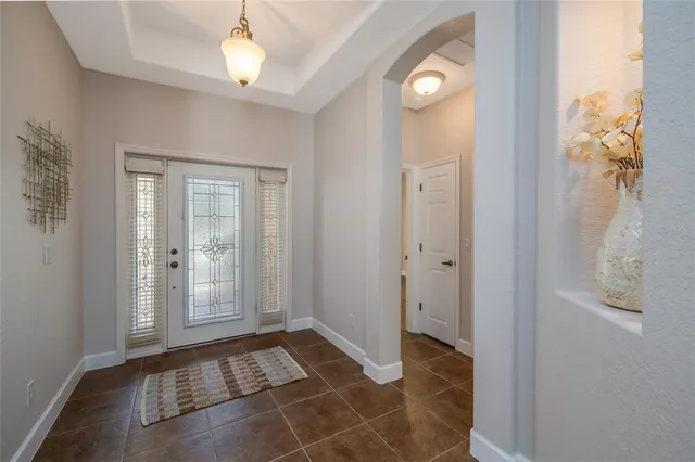 a view of a room with wooden floor and cabinet