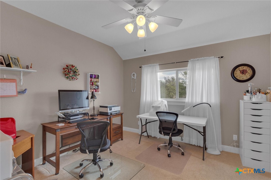 2235 Summit Ridge San Marcos, TX 78666 - Photo 30 of 38 a view of a workspace with furniture and a window
