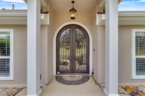 a workspace room with furniture