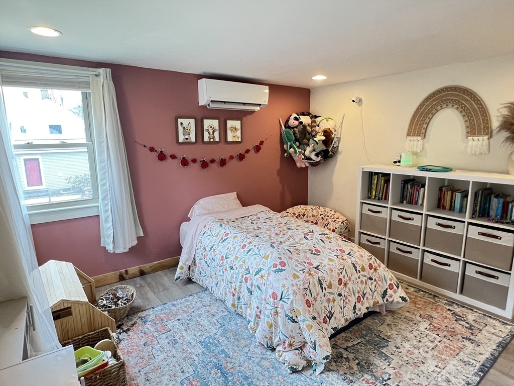 300 Main Road Colrain, MA 01340 - Photo 14 of 41 a bedroom with a bed and dresser