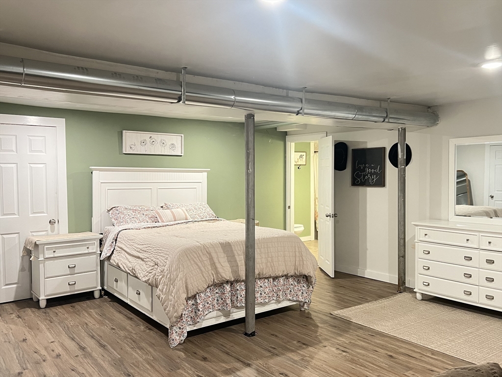 300 Main Road Colrain, MA 01340 - Photo 26 of 41 a bedroom with a bed and a view of bedroom