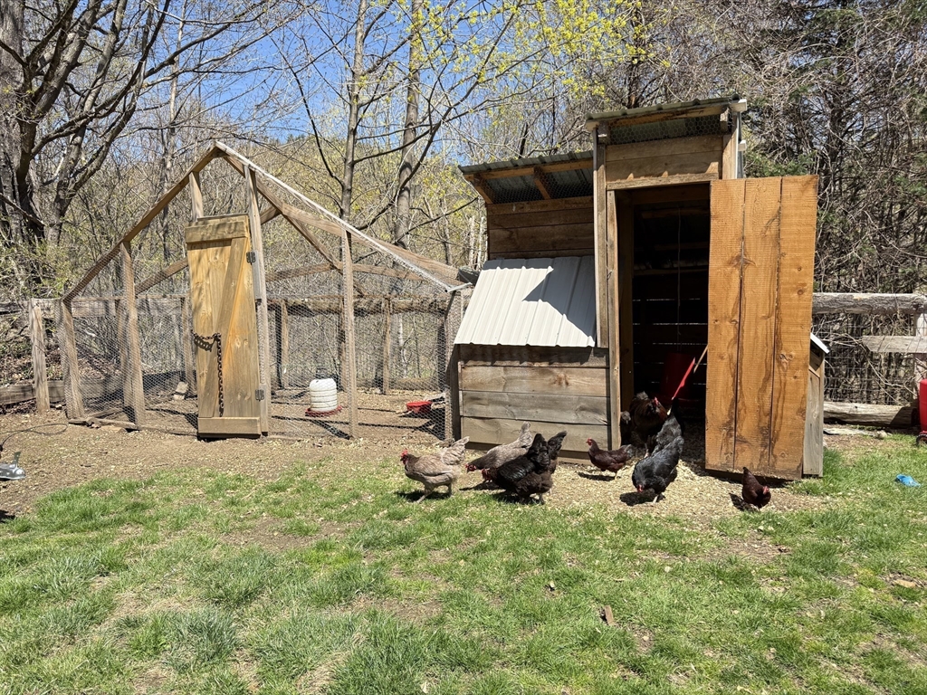 300 Main Road Colrain, MA 01340 - Photo 33 of 41 a view of a house with backyard