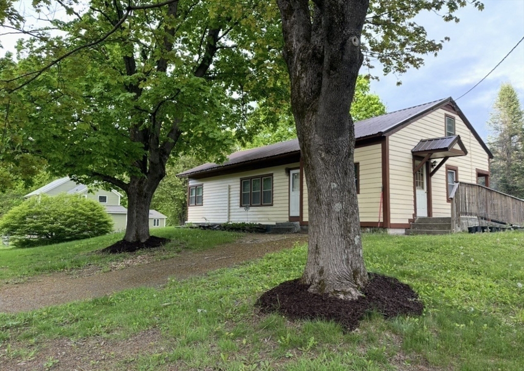 300 Main Road Colrain, MA 01340 - Photo 35 of 41 a front view of house with a garden