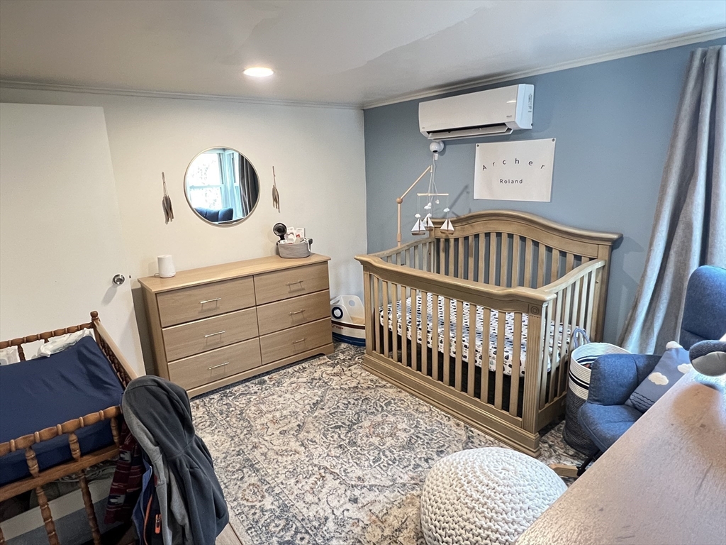 300 Main Road Colrain, MA 01340 - Photo 9 of 41 a bedroom with furniture and a window