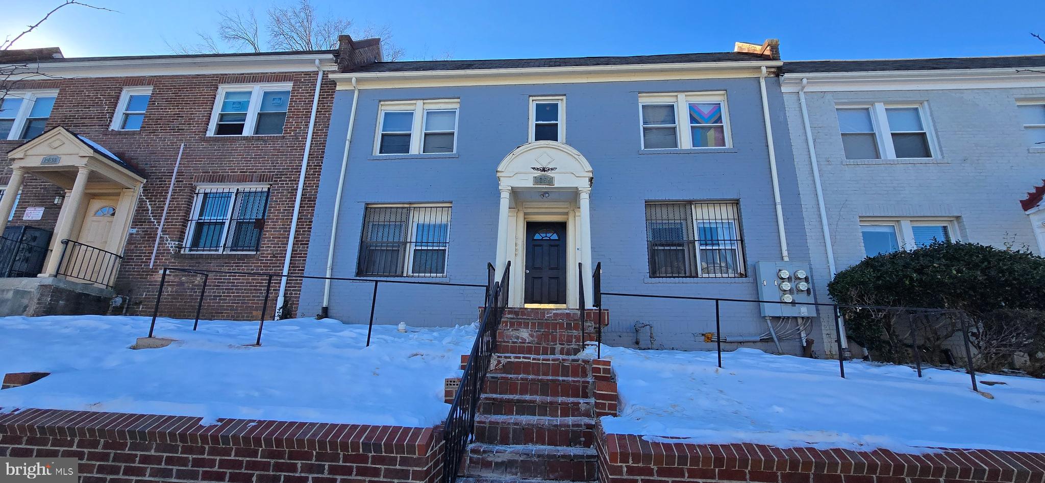 1255 Meigs Place Northeast, Unit 3 Washington, DC 20002 - Photo 12 of 13 a view of a building with many windows