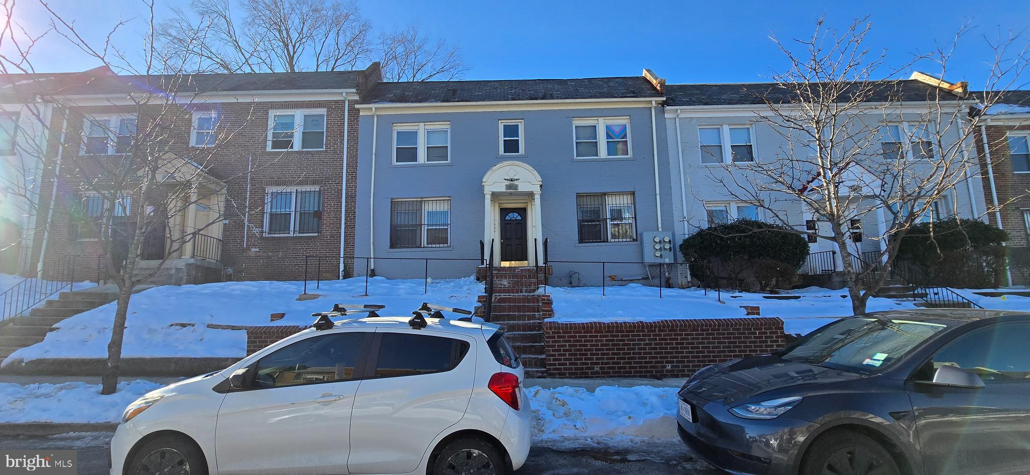 1255 Meigs Place Northeast, Unit 3 Washington, DC 20002 - Photo 13 of 13 a front view of a house with parking space