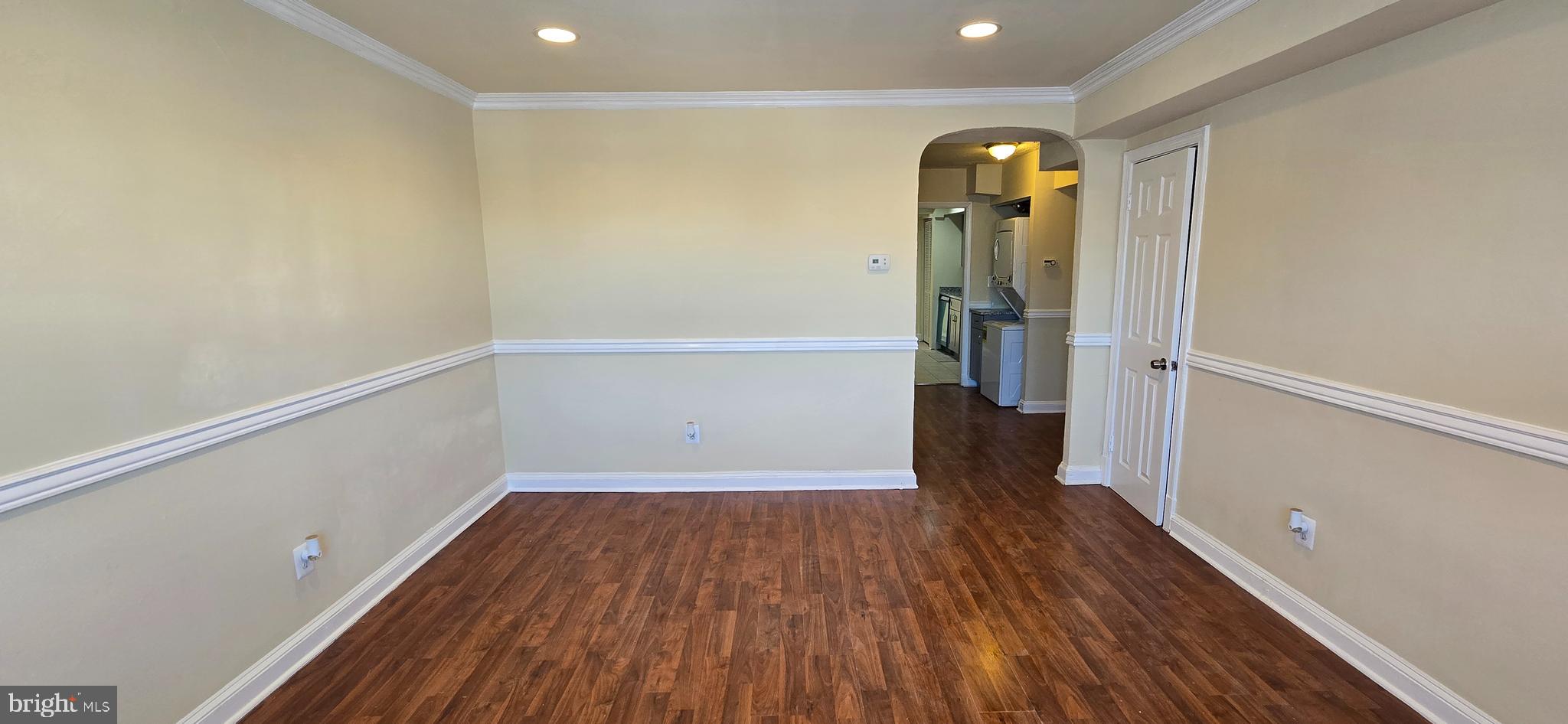 1255 Meigs Place Northeast, Unit 3 Washington, DC 20002 - Photo 2 of 13 a view of a room with wooden floor and staircase