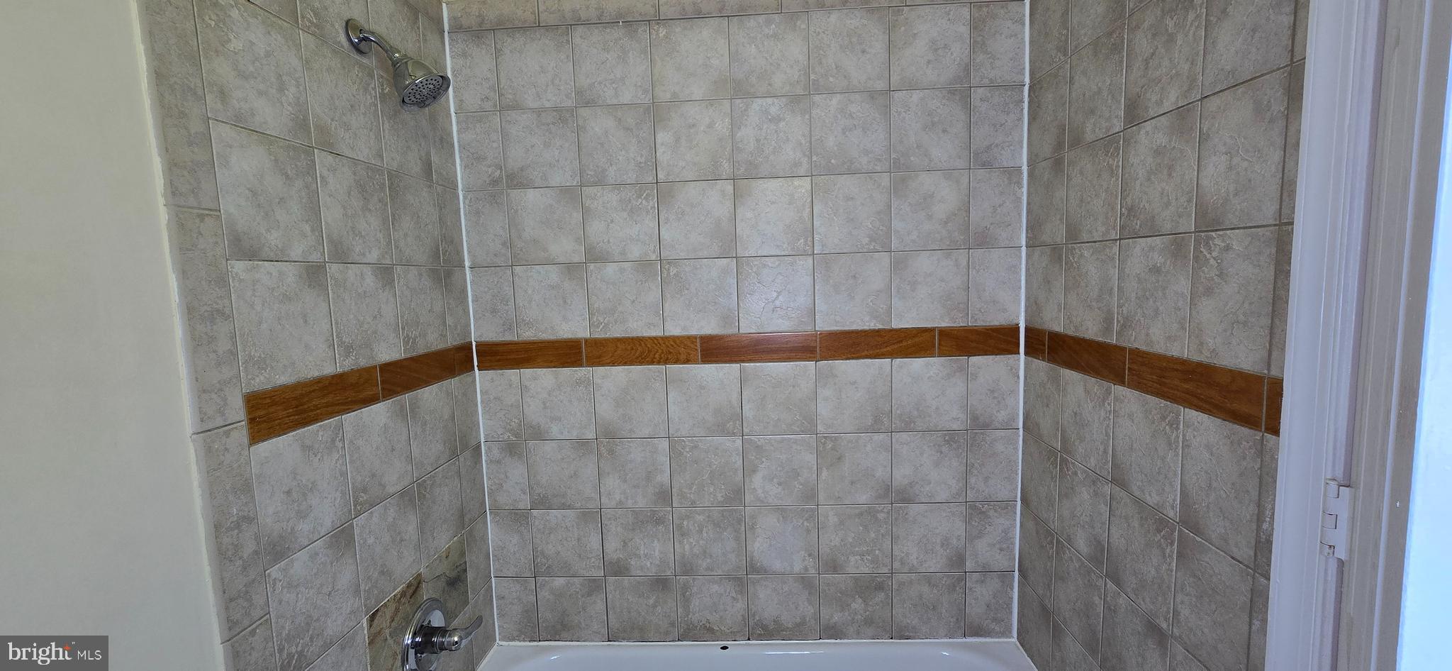 1255 Meigs Place Northeast, Unit 3 Washington, DC 20002 - Photo 6 of 13 a bathroom with a shower