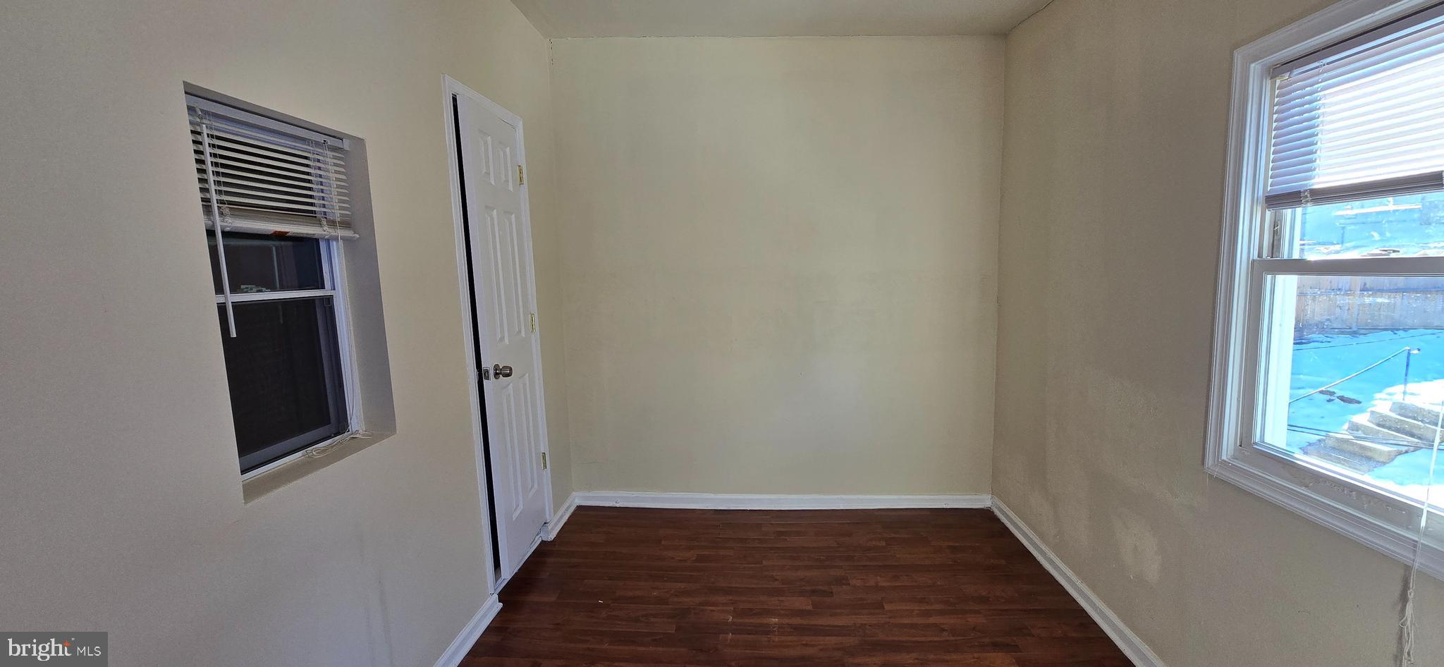 1255 Meigs Place Northeast, Unit 3 Washington, DC 20002 - Photo 10 of 13 a view of empty room with wooden floor and fan