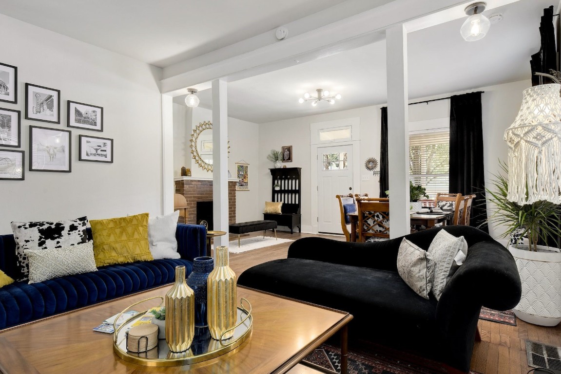 712 East 44th Street, Unit A Austin, TX 78751 - Photo 20 of 40 a living room with fireplace furniture and a large window