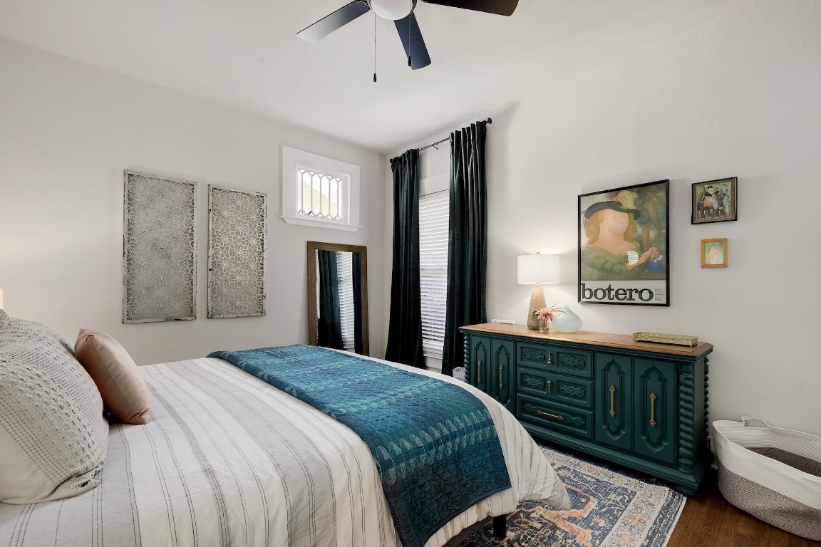 712 East 44th Street, Unit A Austin, TX 78751 - Photo 30 of 40 a bedroom with a bed and a dresser