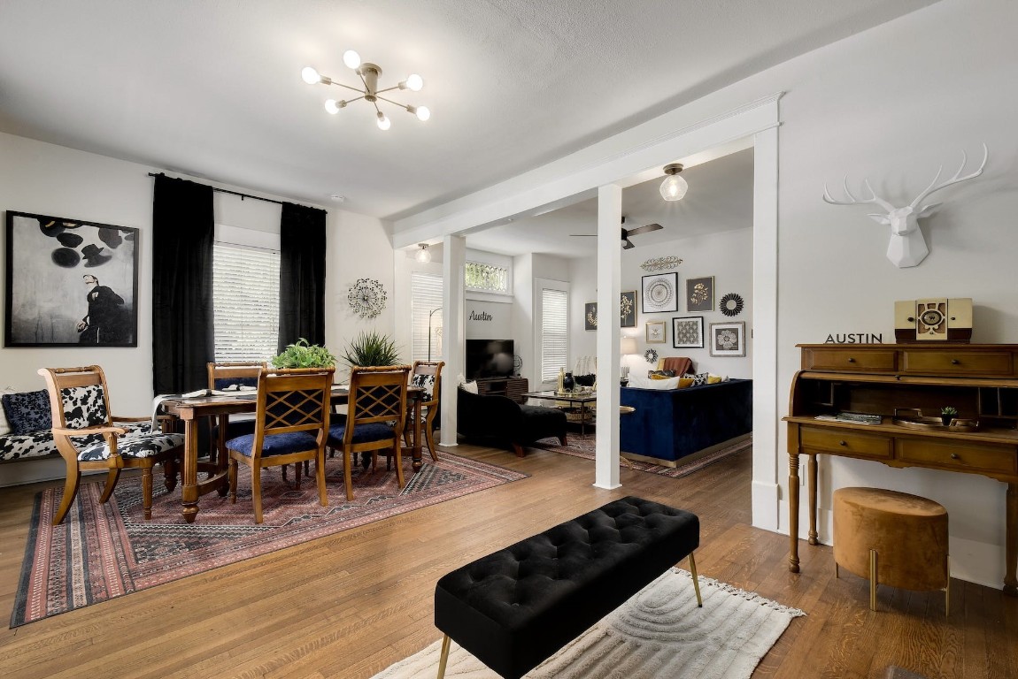 712 East 44th Street, Unit A Austin, TX 78751 - Photo 8 of 40 a living room with furniture a fireplace and wooden floor