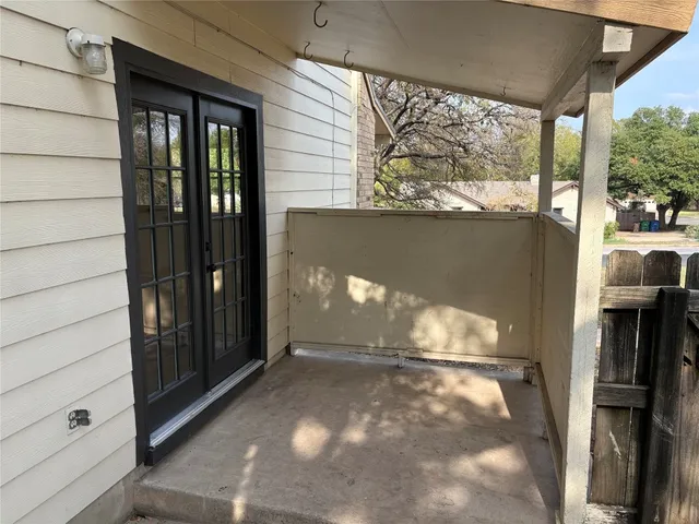 a view of a porch of a house