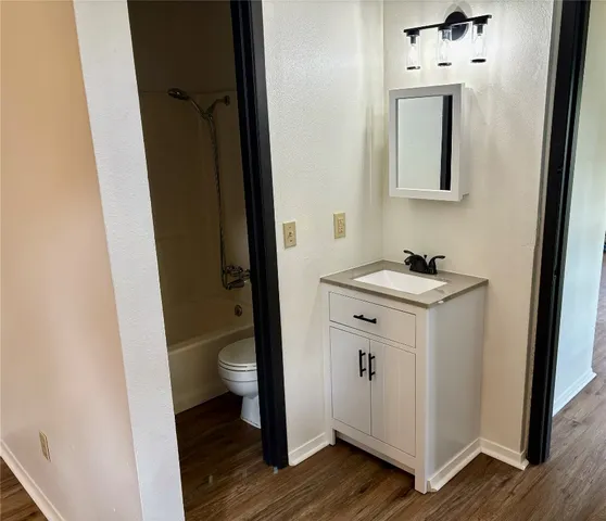 a bathroom with a sink and a toilet