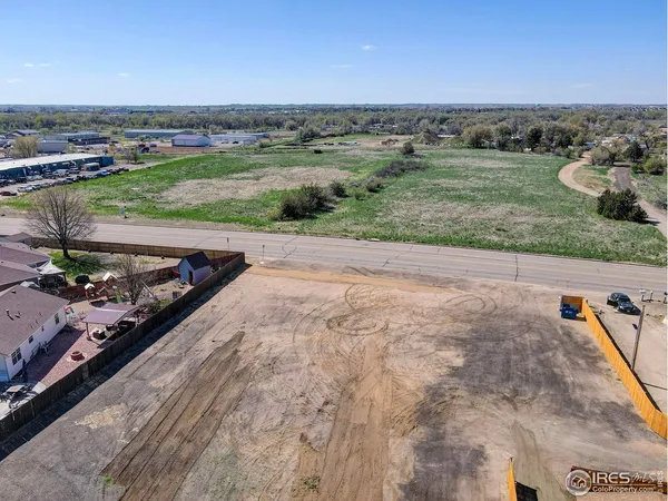 an aerial view of a yard with horses