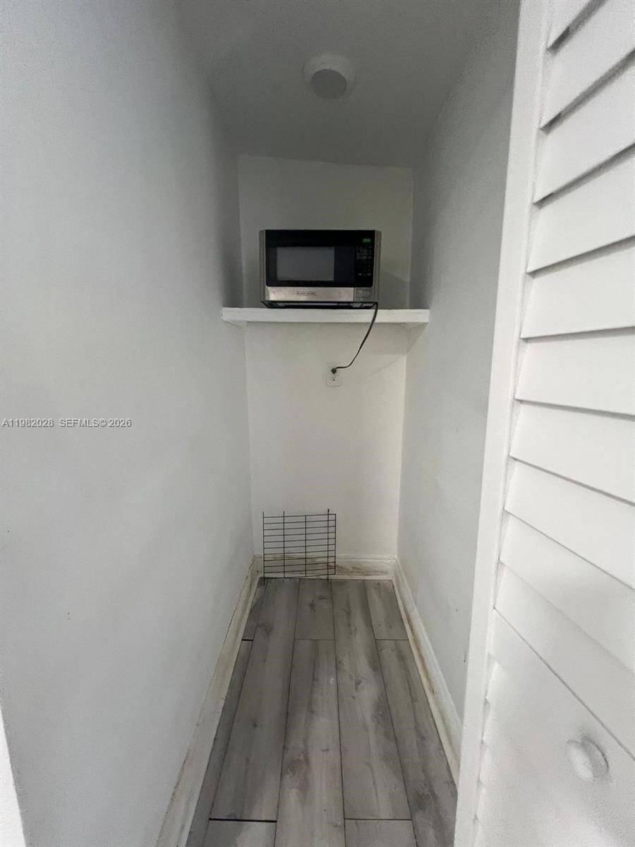 1053 Northeast 149th Street Miami, FL 33161 - Photo 2 of 13 a view of a hallway