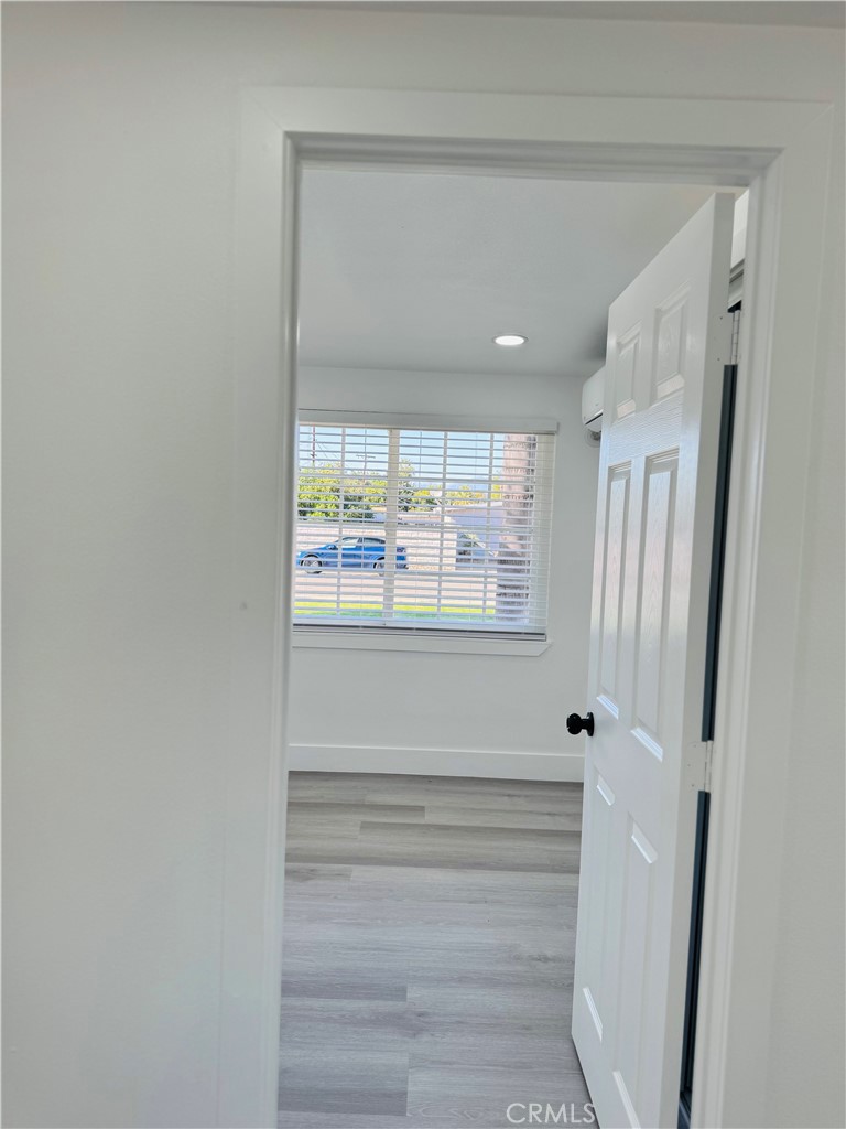 9314 Martha Way Riverside, CA 92503 - Photo 23 of 25 a view of walk in closet with window