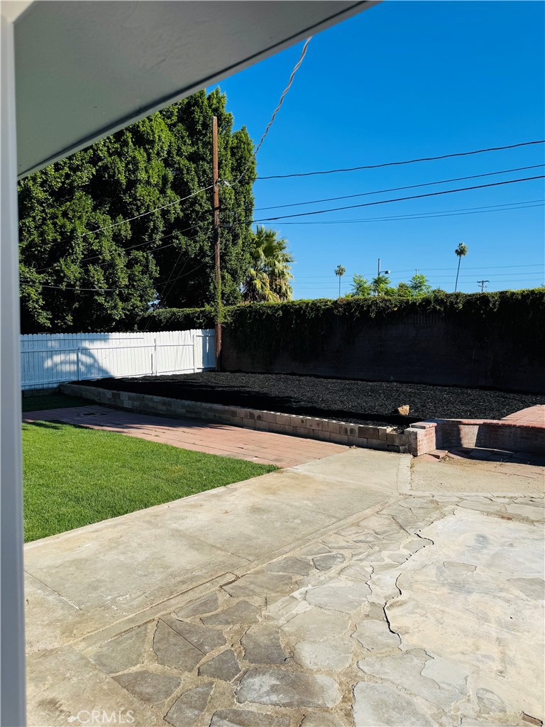 9314 Martha Way Riverside, CA 92503 - Photo 3 of 25 a view of swimming pool with outdoor seating and plants