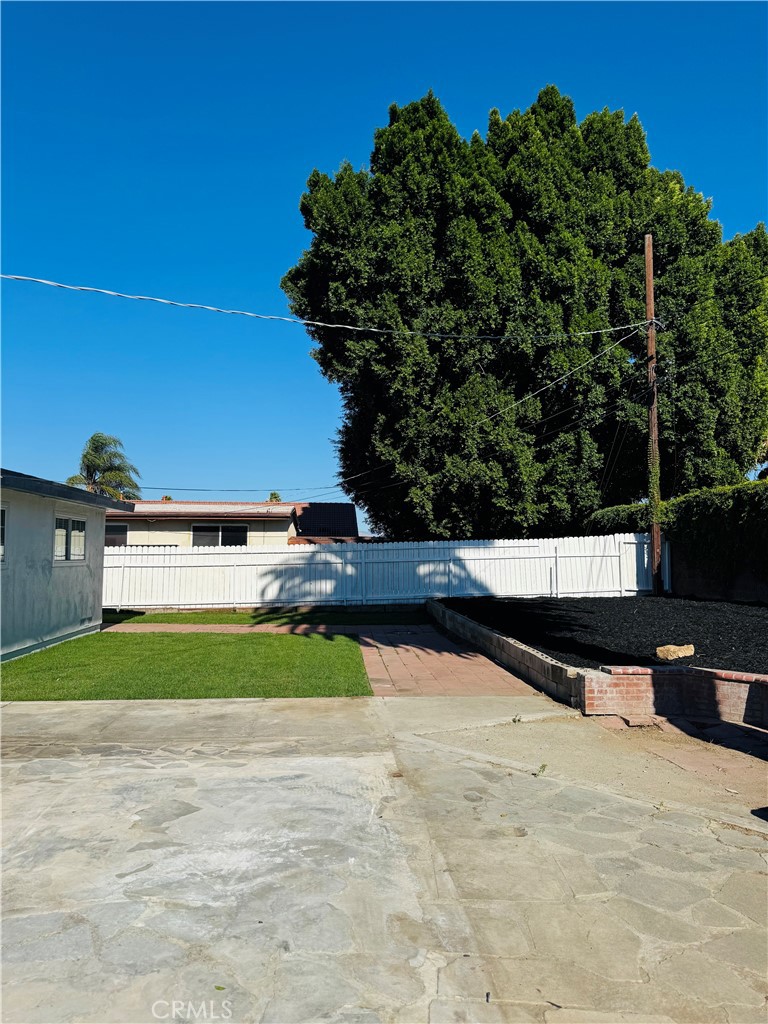 9314 Martha Way Riverside, CA 92503 - Photo 4 of 25 a view of swimming pool with a yard