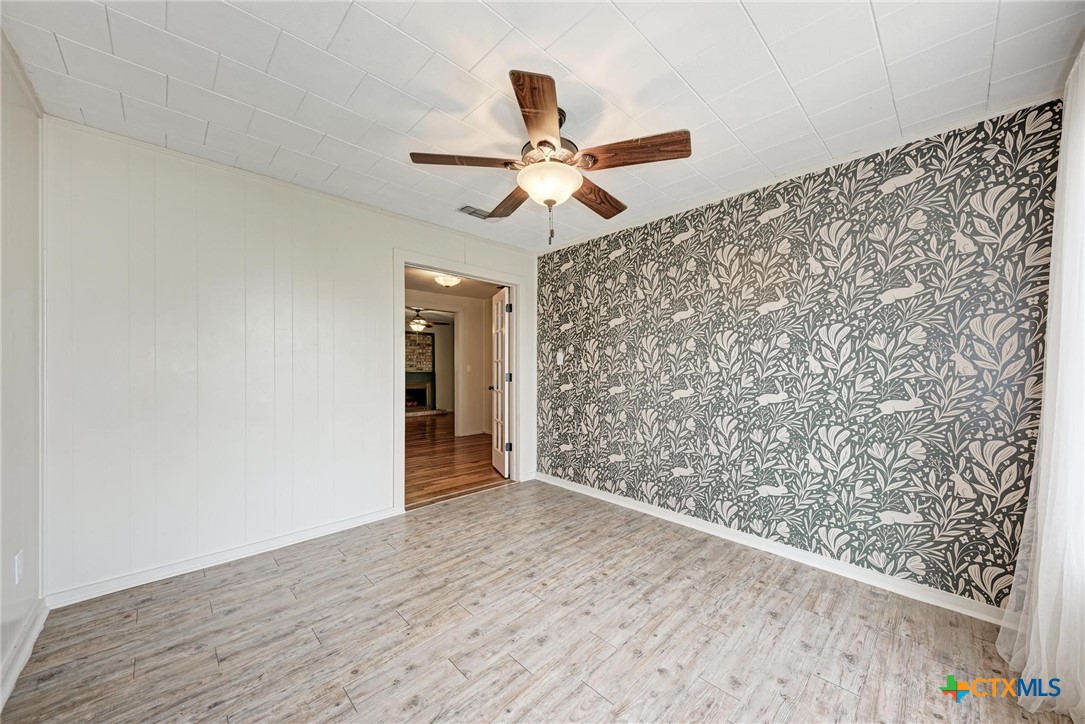 501 North Ridge Street Lampasas, TX 76550 - Photo 17 of 46 wooden floor in an empty room