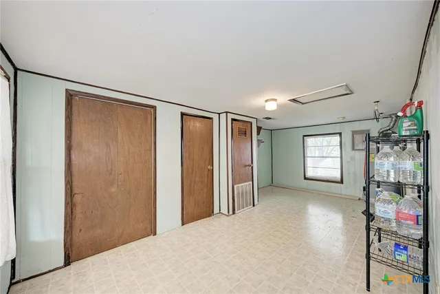 a view of livingroom with furniture and window