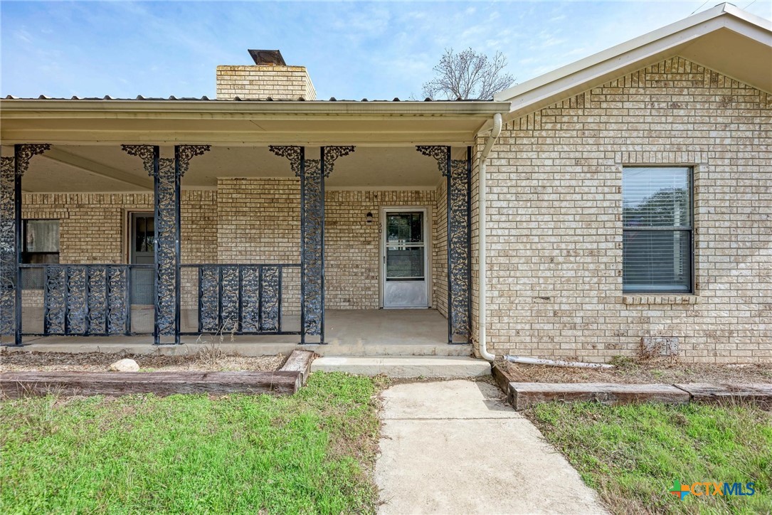 501 North Ridge Street Lampasas, TX 76550 - Photo 8 of 46 a view of a brick house with a outdoor space