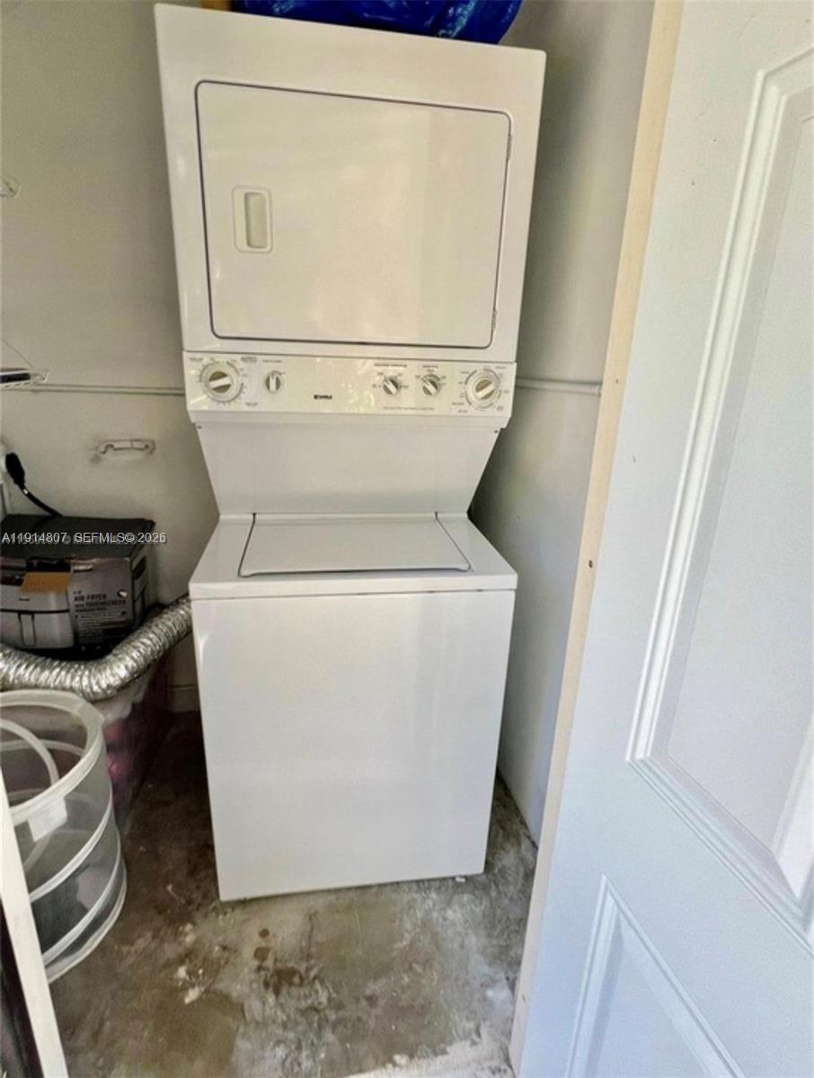 3520 Southwest 25th Street, Unit 3520 Miami, FL 33133 - Photo 16 of 18 a white toilet sitting next to a sink