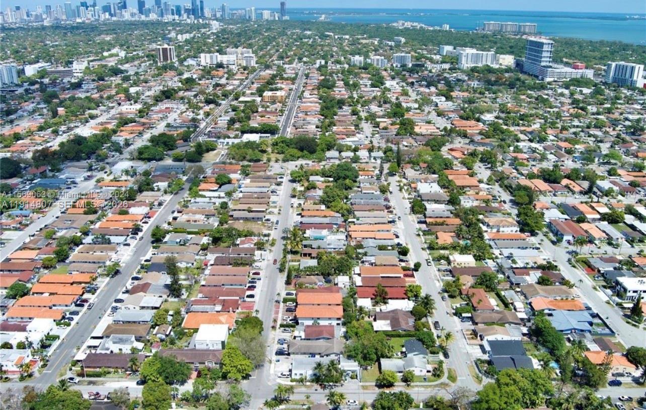 3520 Southwest 25th Street, Unit 3520 Miami, FL 33133 - Photo 18 of 18 an aerial view of residential houses with city view
