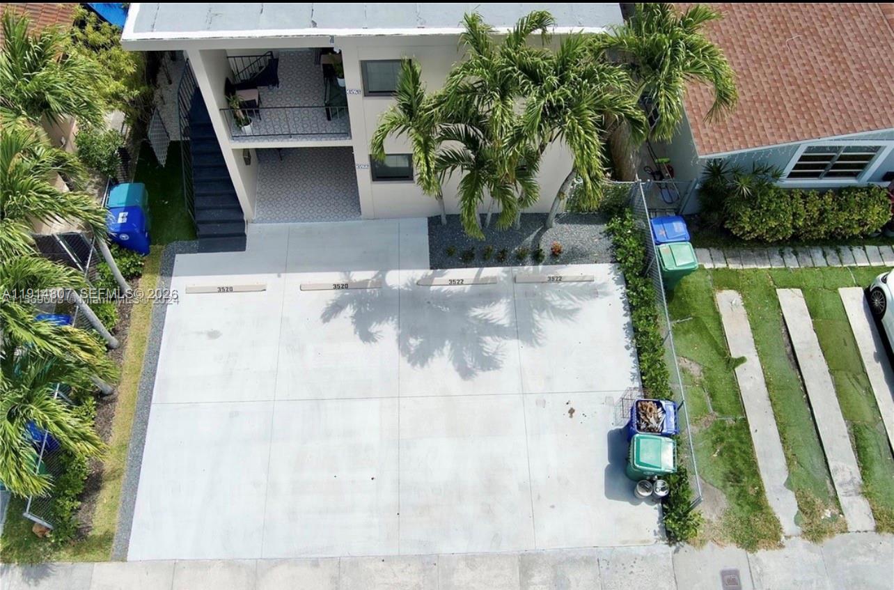 3520 Southwest 25th Street, Unit 3520 Miami, FL 33133 - Photo 5 of 18 a front view of a house with a yard
