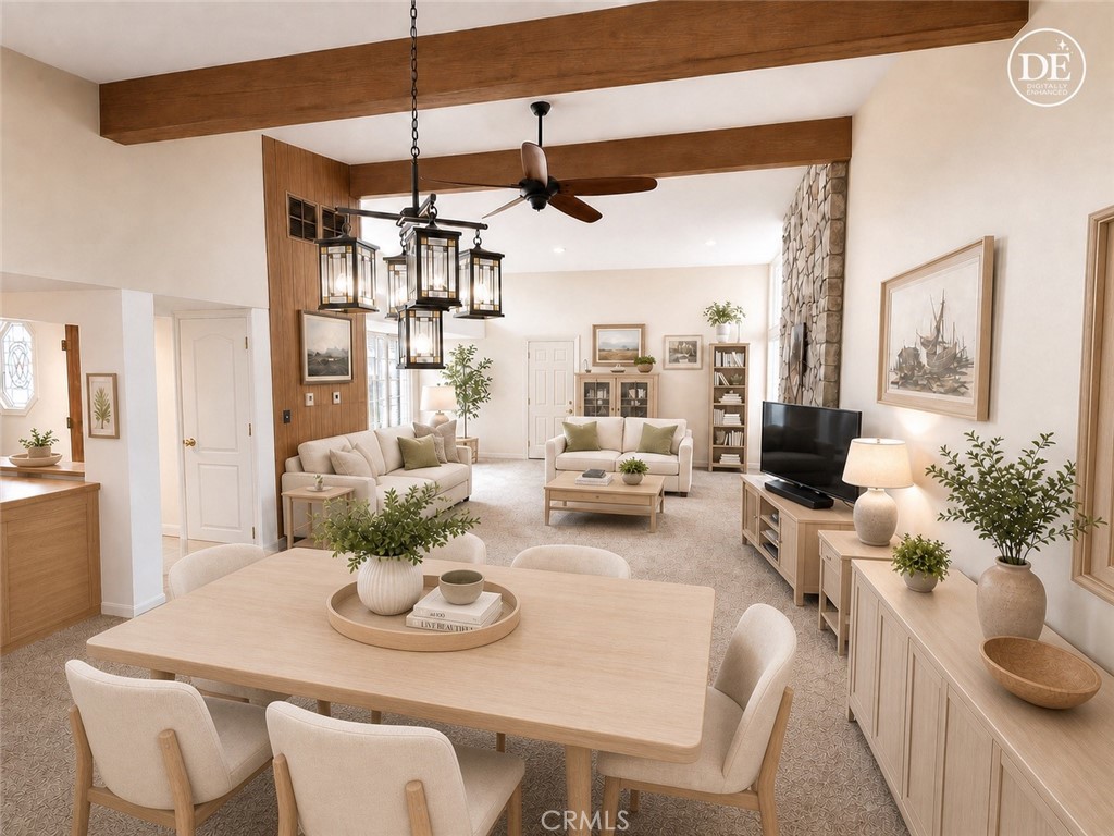 11582 Foster Road Los Alamitos, CA 90720 - Photo 6 of 26 Dining room to livingroom:
Note: Furniture in this photo has been digitally enhanced by AI