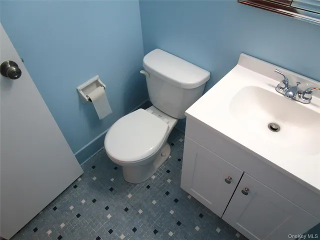 a kitchen with granite countertop a sink and a stove top oven