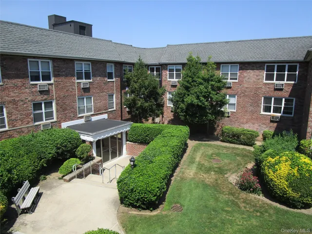 a view of front door with wooden floor