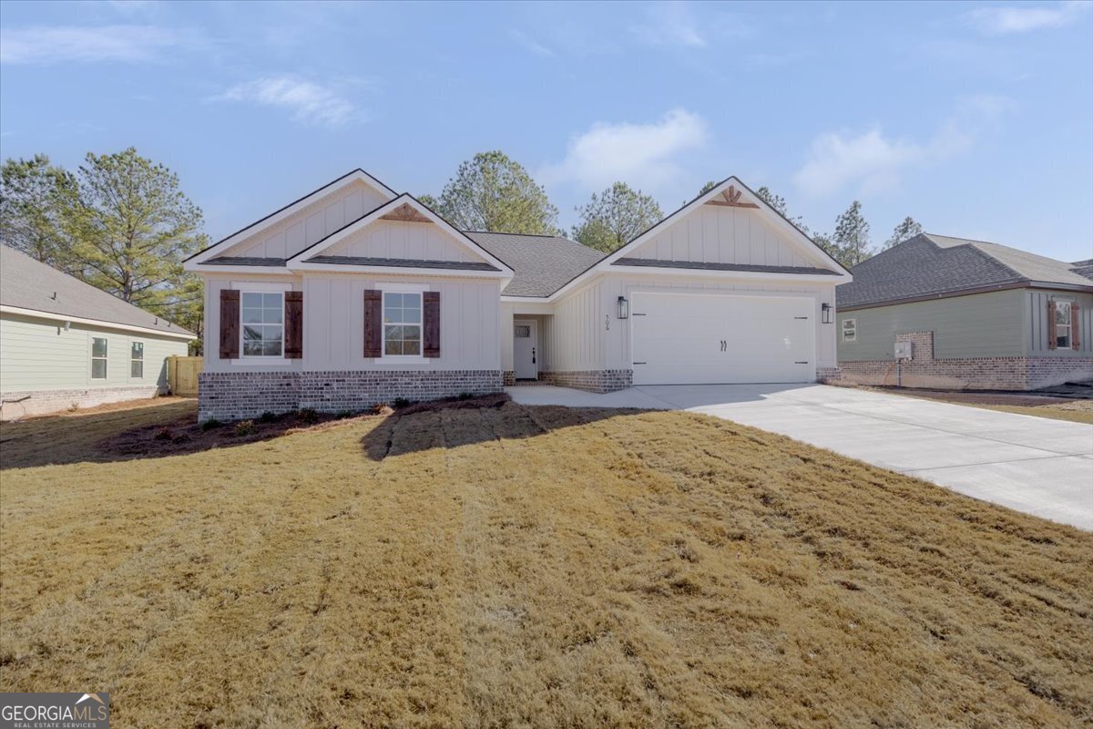 506 New Hope Drive Perry, GA 31069 - Photo 2 of 51 a front view of a house with a yard